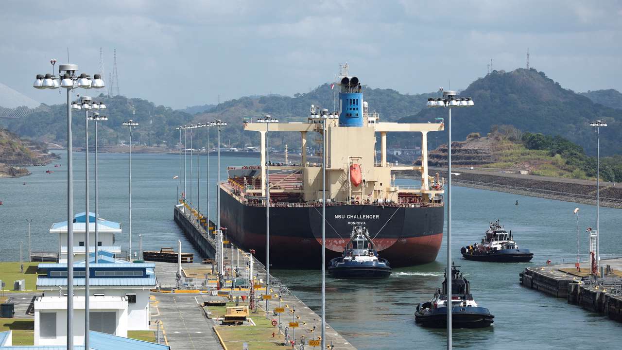 FILE PHOTO: Cargo vessels transit through the Panama Canal, on the outskirts of Panama City