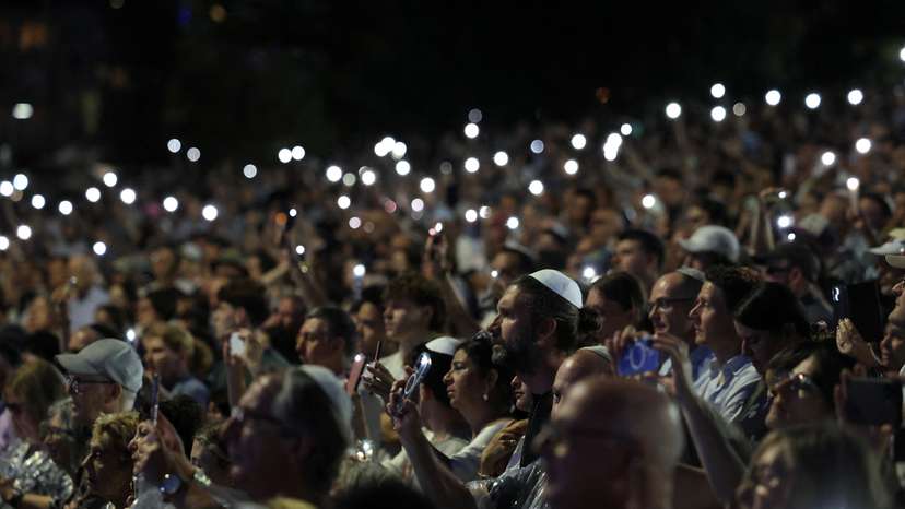 People attend the ‘Light Over Darkness’ vigil in Sydney