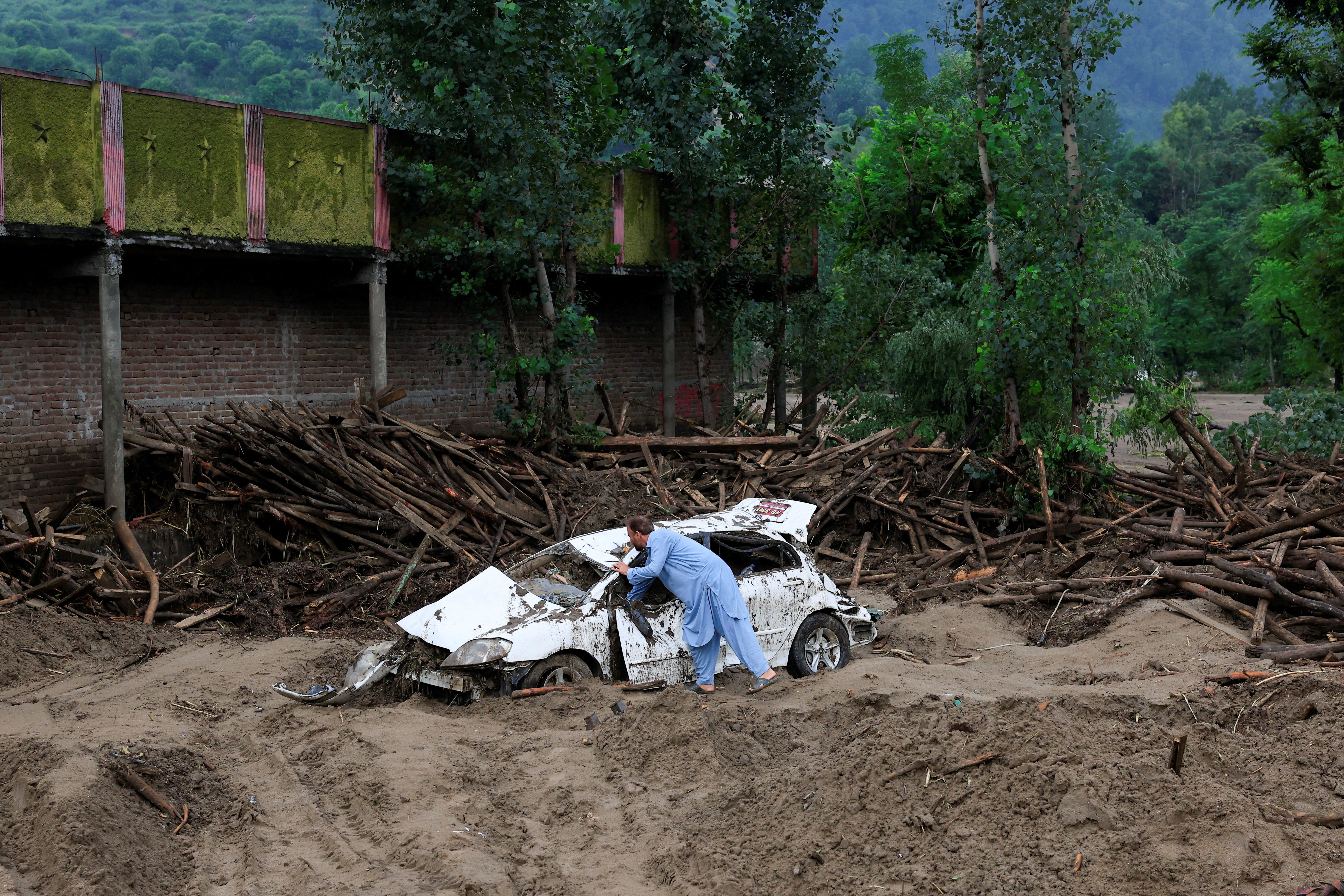 Aftermath of a storm that caused heavy rains and flooding in Bayshonai Kalay in Buner