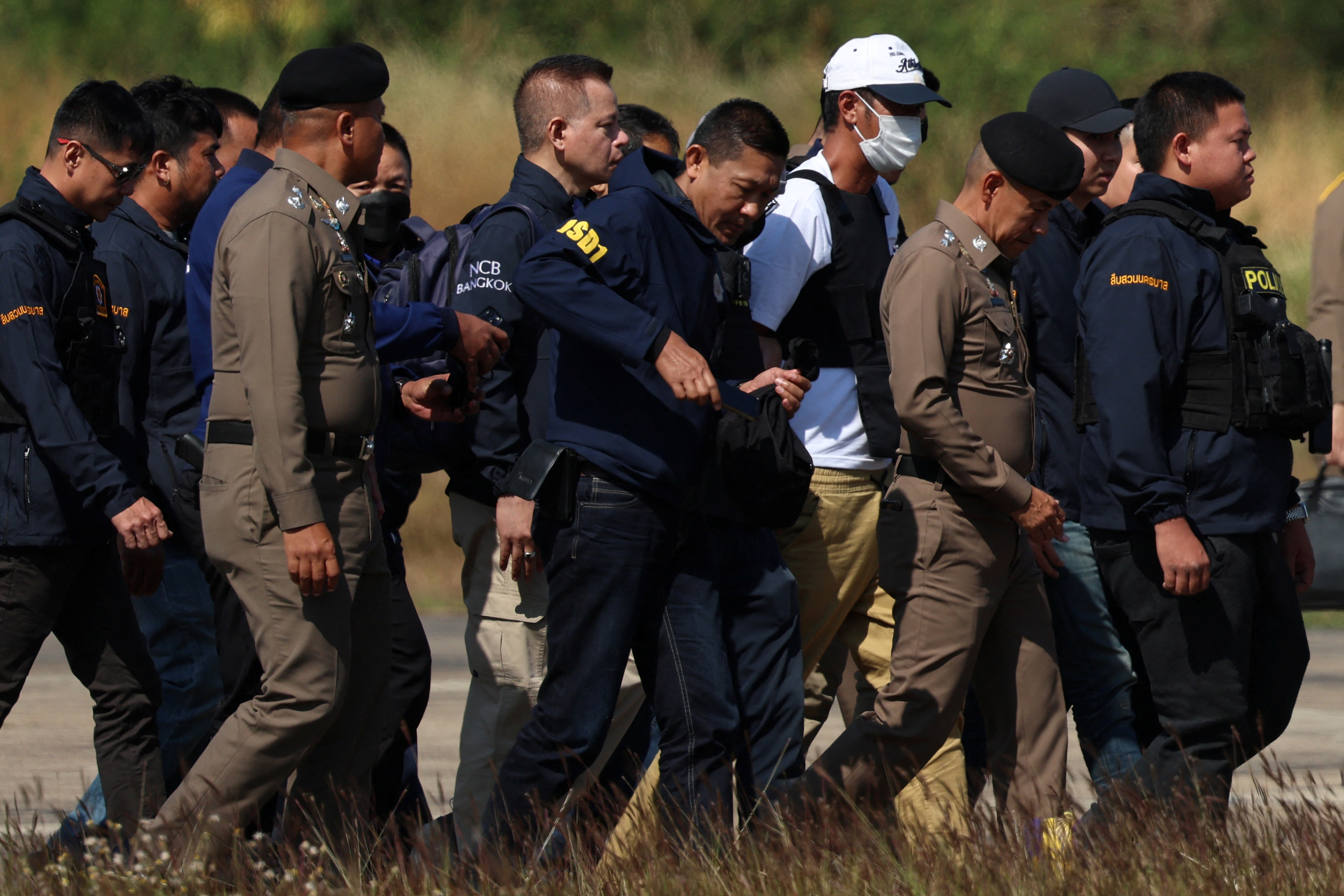 Ekalak Paenoi, a suspect in the assassination of a former politician with now-dissolved Cambodia National Rescue Party (CNRP) Lim Kimya, 74, arrives in Thailand