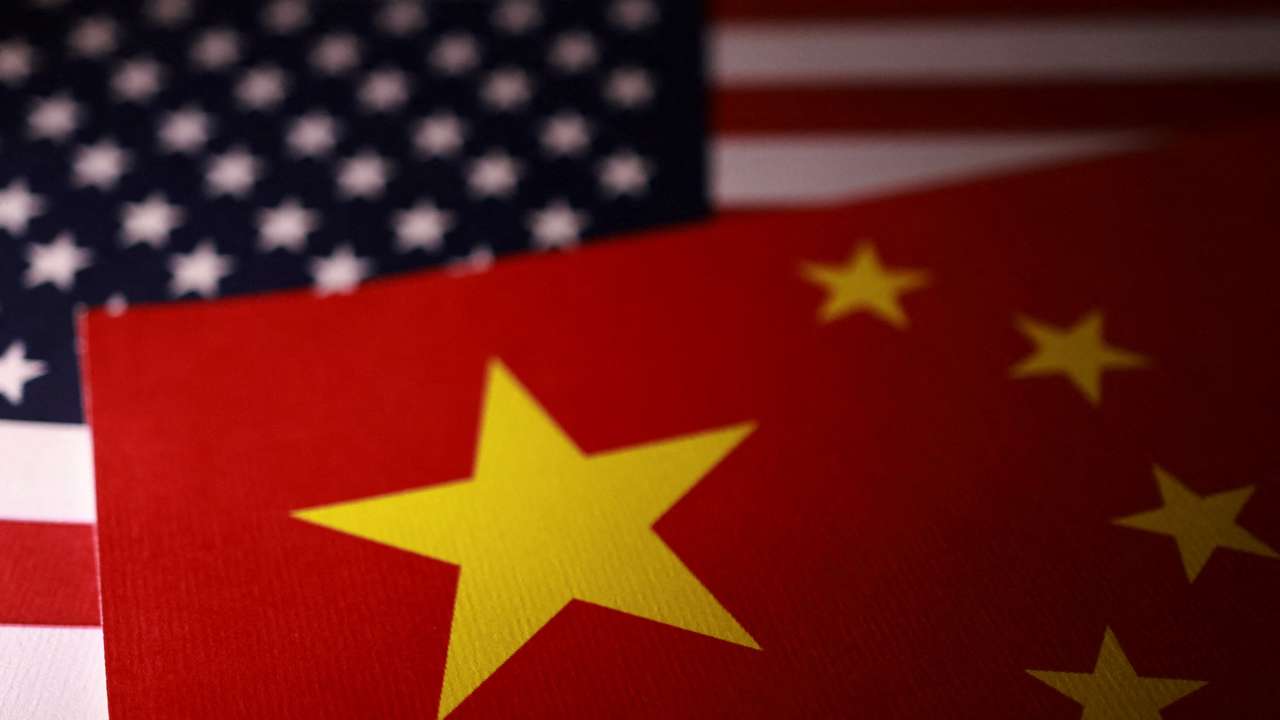 Illustration shows U.S. and Chinese flags