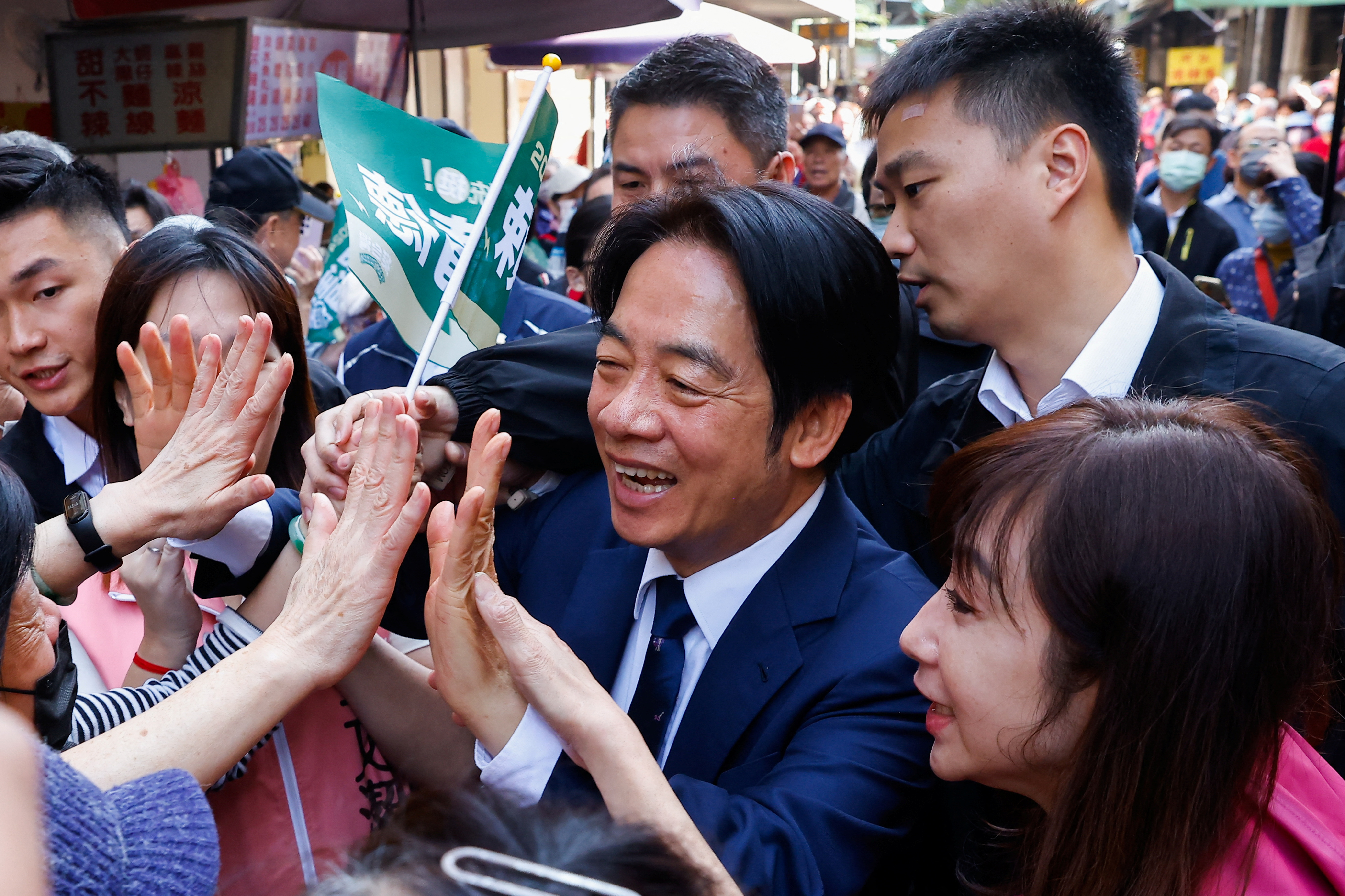 Lai Ching-te, Taiwan's vice president and the ruling Democratic Progressive Party's (DPP) presidential candidate interacts with supporters in Taipei