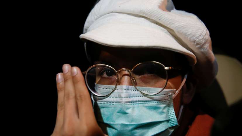 Supporters of anti-government protest leaders arrested and charged with lese majeste wait for their release in Bangkok