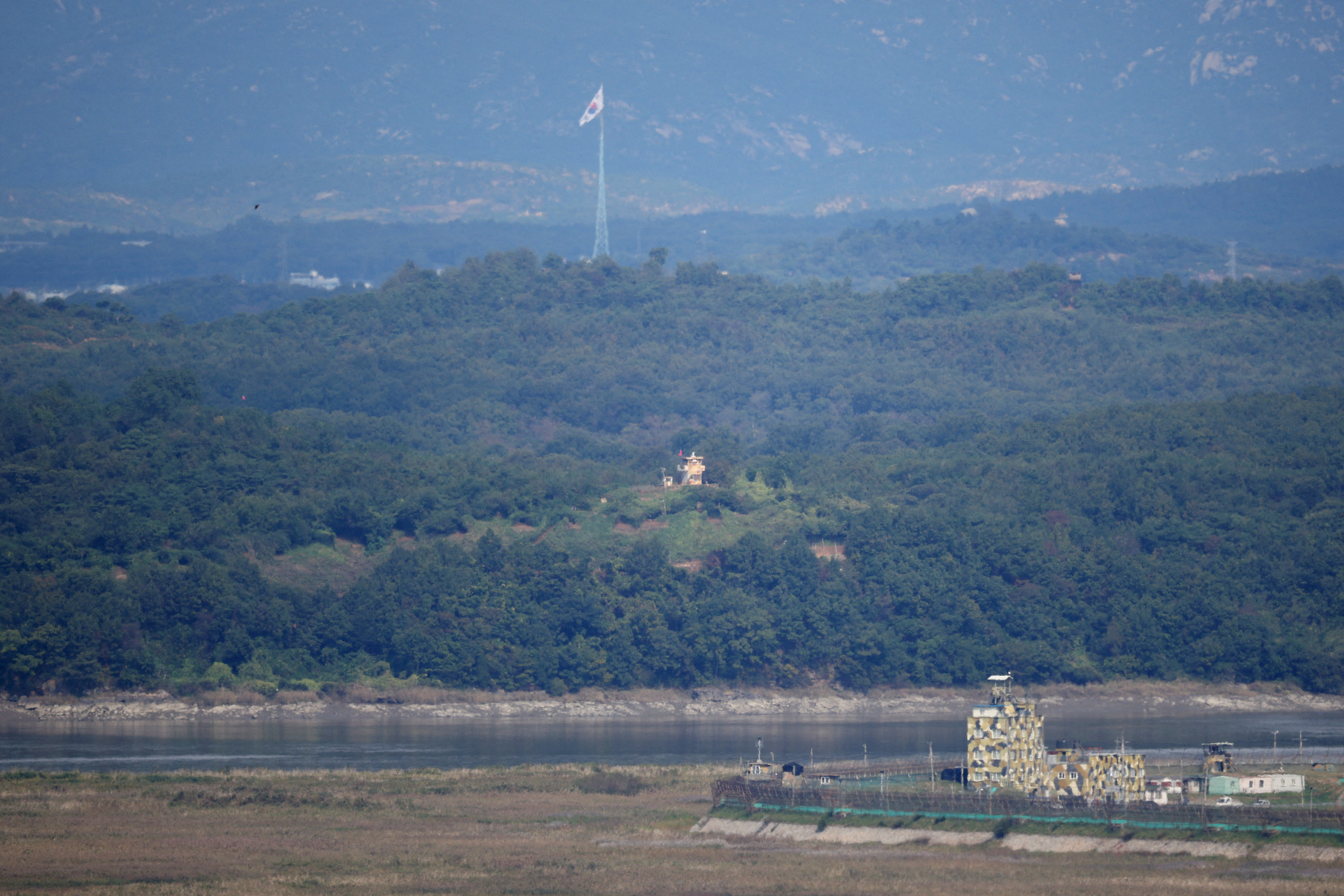 FILE PHOTO: North Korean and South Korean guard posts face each other