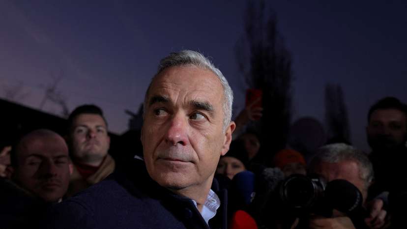FILE PHOTO: Presidential candidate Georgescu makes statements to the press in Izvorani