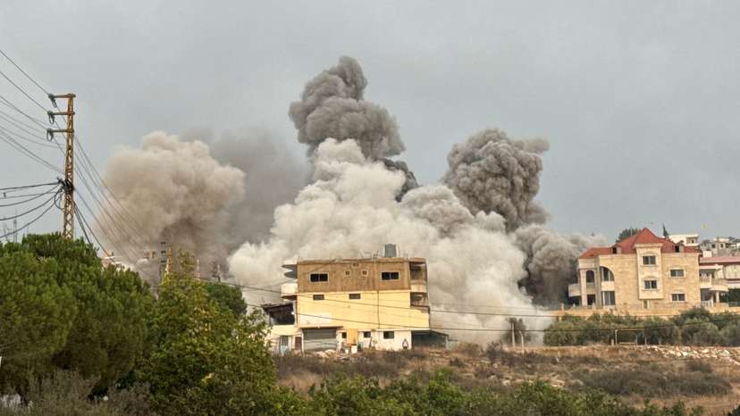 Smoke rises after Israeli strikes following Israeli military's evacuation orders, in Tayr Debba