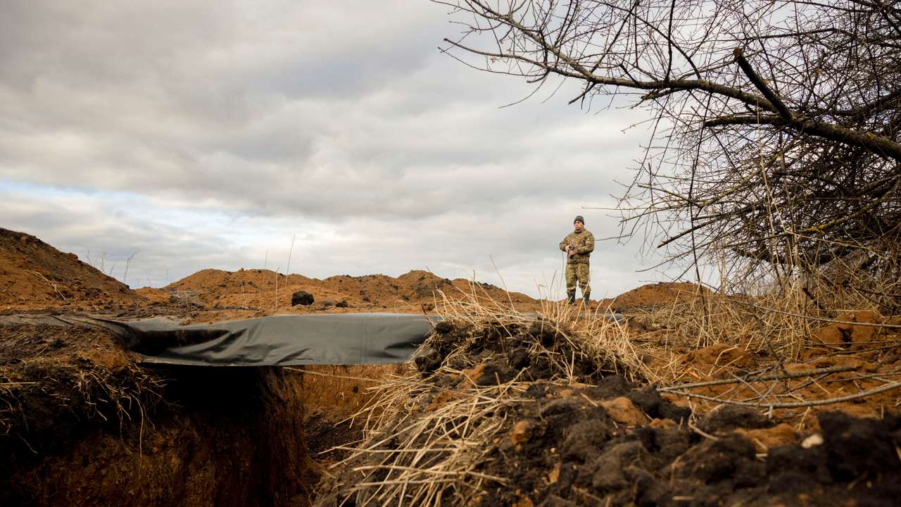 Ukraine builds barricades, digs trenches as focus shifts to defence