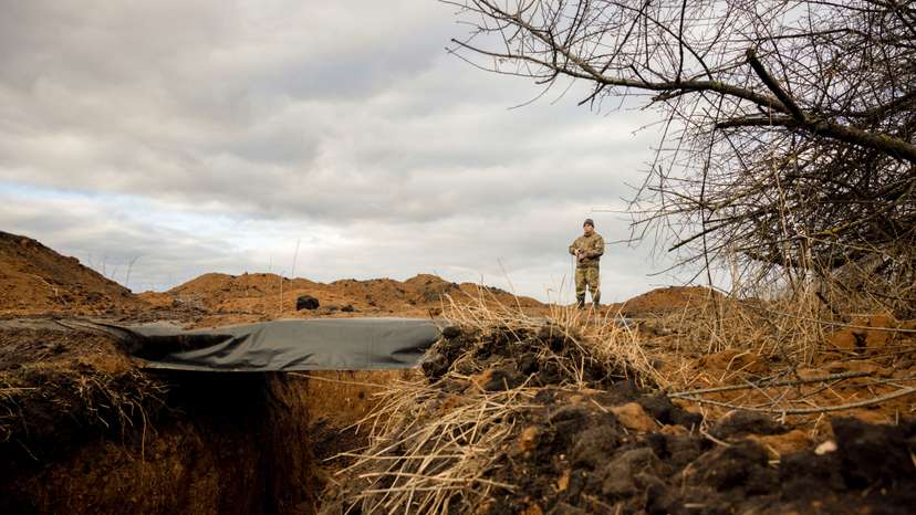 Ukraine builds barricades, digs trenches as focus shifts to defence