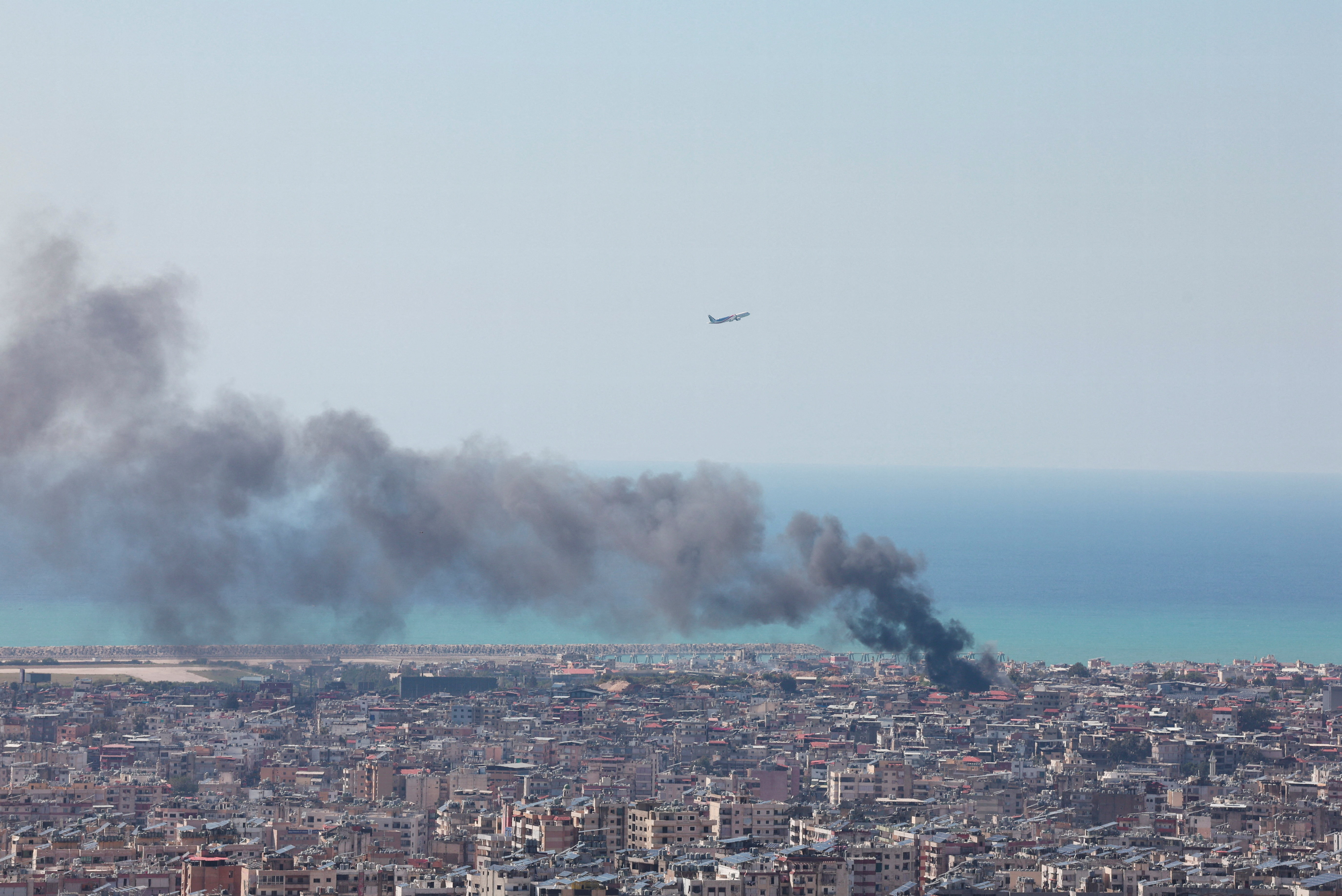 Smoke rises after an Israeli strike, in Beirut