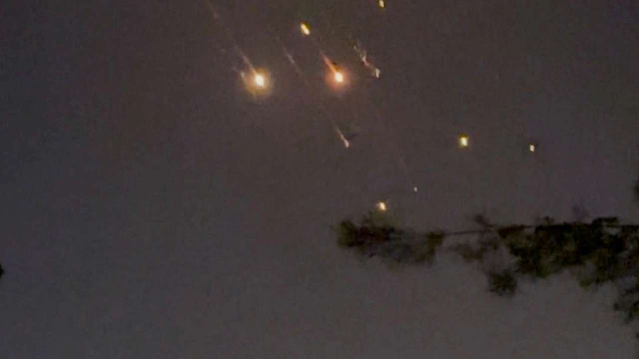 Objects are seen in the sky over Amman after Iran launched drones towards Israel