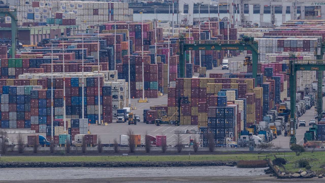 A cargo ship full of shipping containers is seen at the port of Oakland as trade tensions escalate over U.S. tariffs