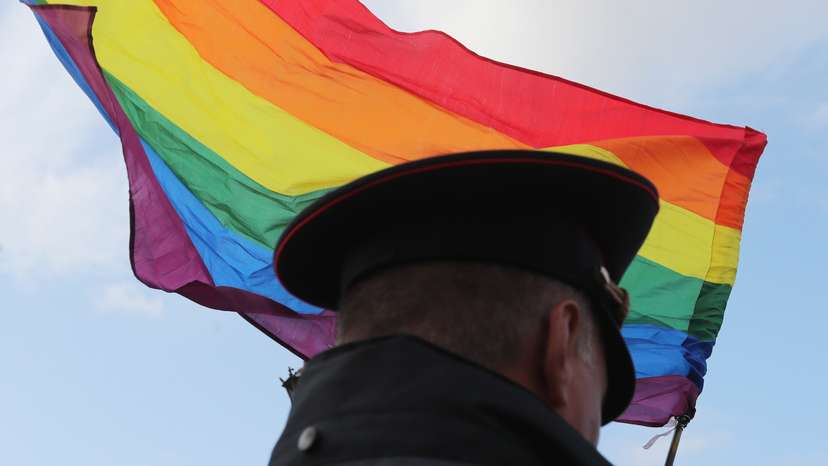 A law enforcement officer stands guard during the LGBT community rally "X St.Petersburg Pride" in Saint Petersburg