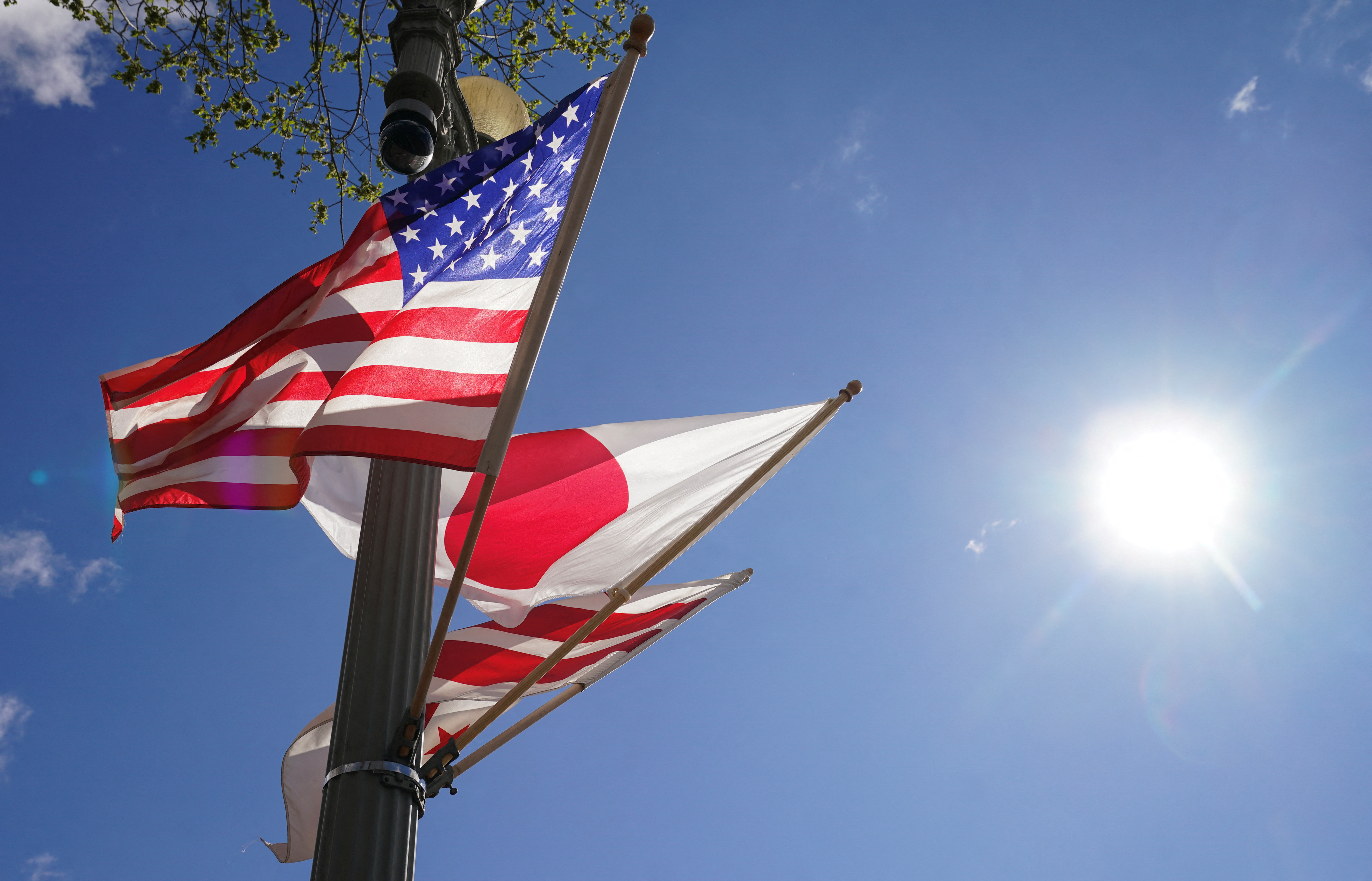 FILE PHOTO: Japanese and U.S. flags at the White House in Washington