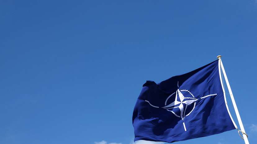 A NATO flag flutters at NATO headquarters in Brussels