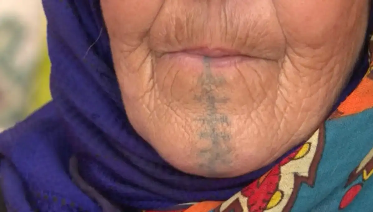 An Amazigh woman with a facial tattoo