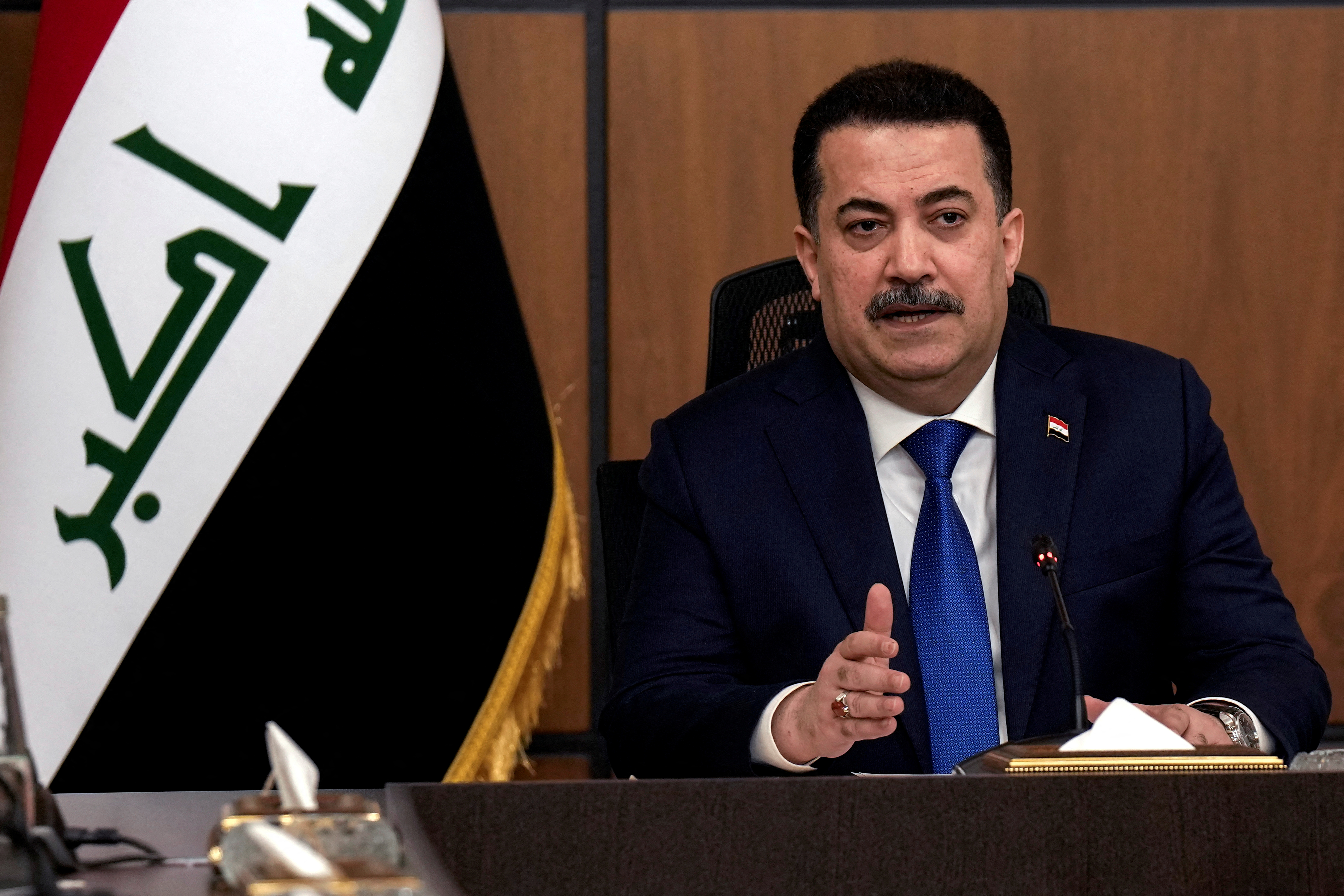 FILE PHOTO: Iraqi Prime Minister Mohammed Shia al-Sudani attends the first session of negotiations between Iraq and the United States to end the International Coalition mission in Baghdad