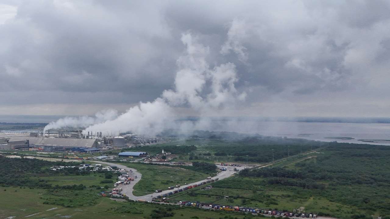 FILE PHOTO: A drone view shows smoke as trucks gather near the Dangote Oil Refinery at the Lekki Free Trade Zone in Ibeju Lekki
