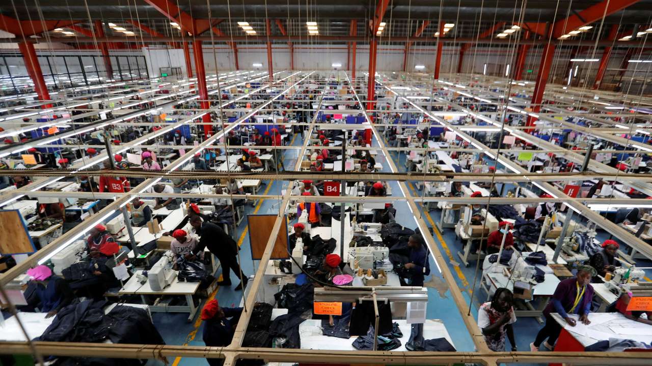 FILE PHOTO: Kenyan workers prepare clothes for export at the United Aryan EPZ factory in Ruaraka district of Nairobi