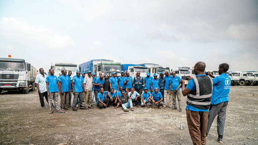 FILE PHOTO: WFP trucks carry aid to Darfur and other famine-stricken parts through the Adre Border crossing