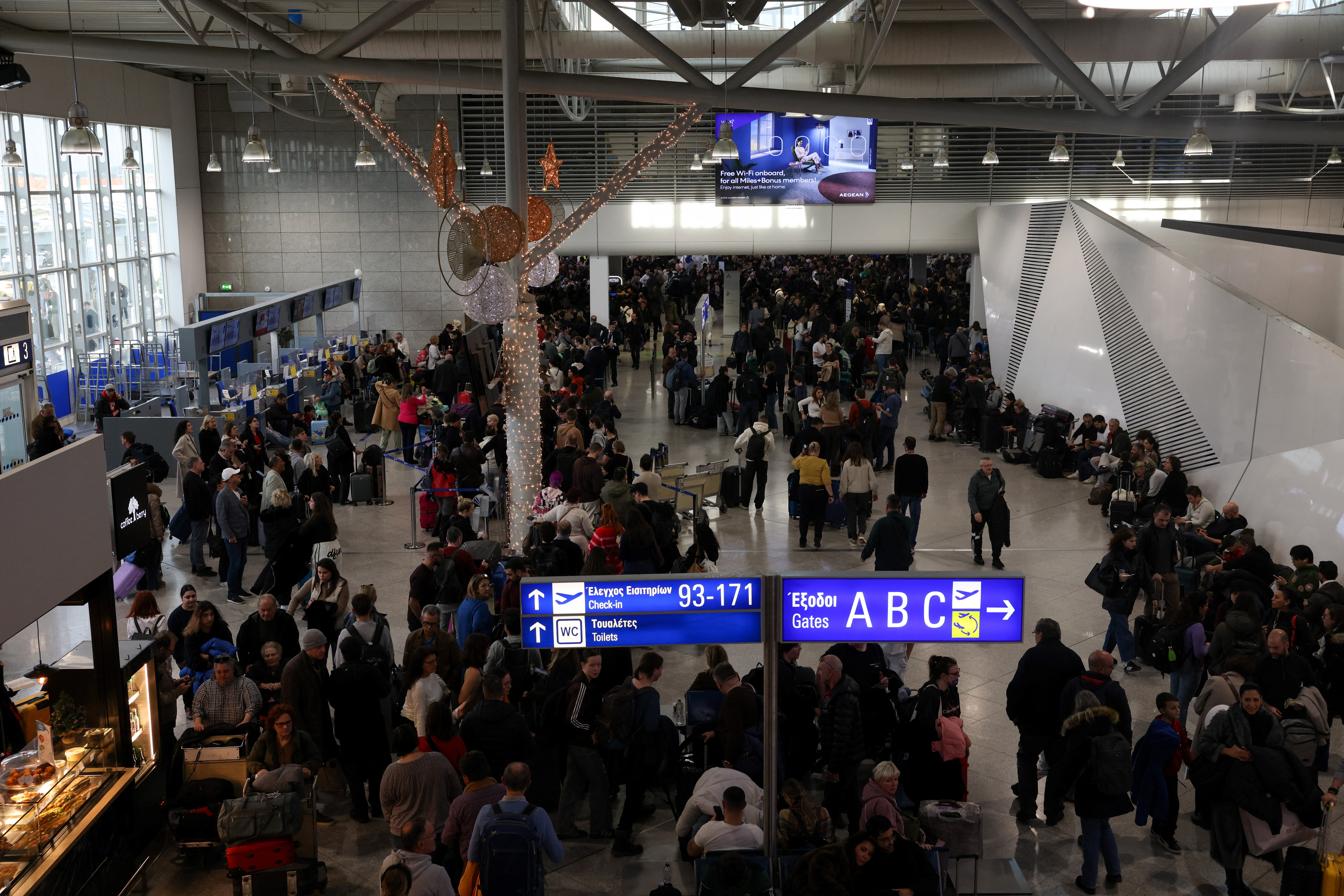 Suspended arrivals and departures across airports in Greece after unspecified issues affecting radio frequencies, in Athens