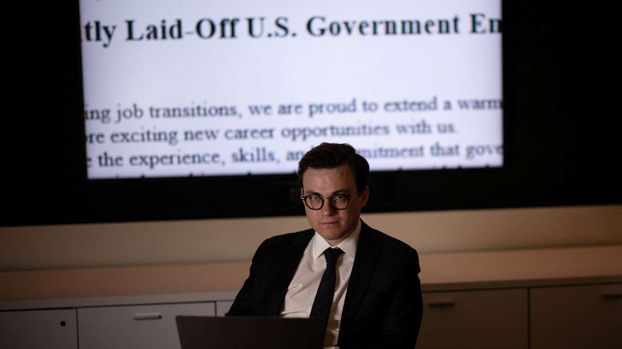 Max Lesser, a senior analyst on emerging threats at the Foundation for Defense of Democracies poses for a portrait at an office in Washington, D.C.
