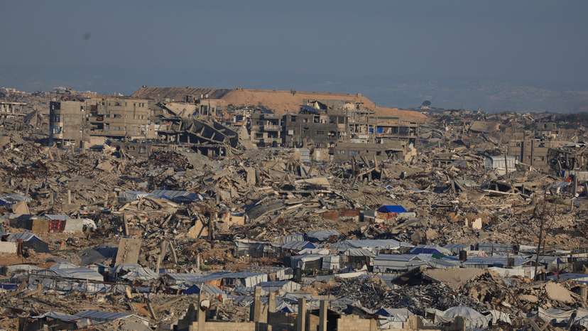 General view of destroyed houses in areas marked by the Israeli military’s yellow line east of Gaza