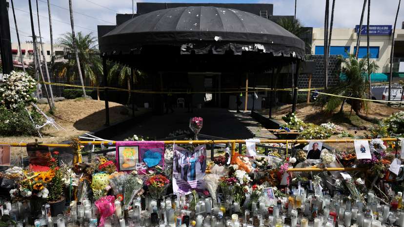 A makeshift memorial stands outside the remains of the Jet Set nightclub after a deadly roof collapse, in Santo Domingo