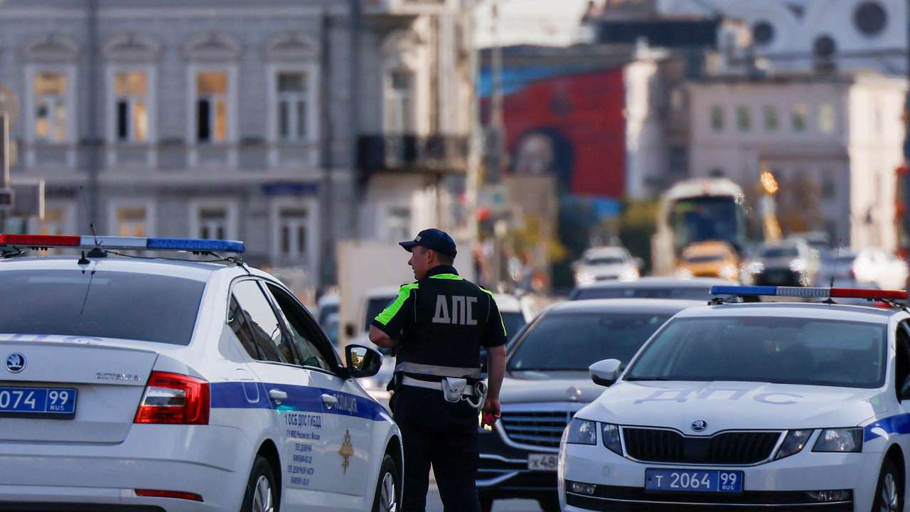 A traffic police officer works in a street in central Moscow