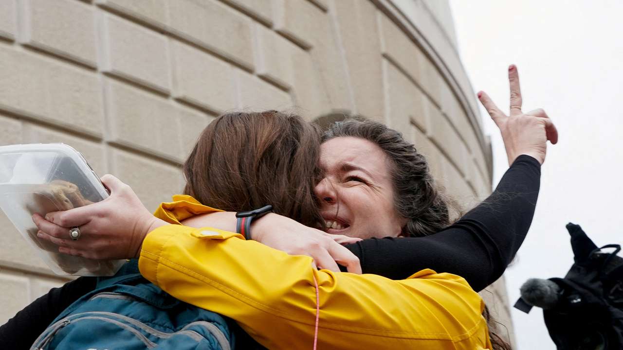Former U.S. Agency for International Development (USAID) workers are applauded, during a sendoff in Washington