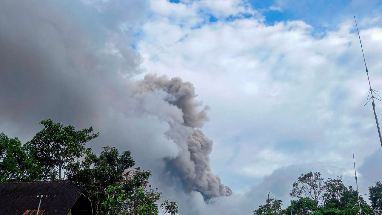 Mount Marapi volcano spews volcanic ash as seen from Nagari Sungai Pua, in Agam