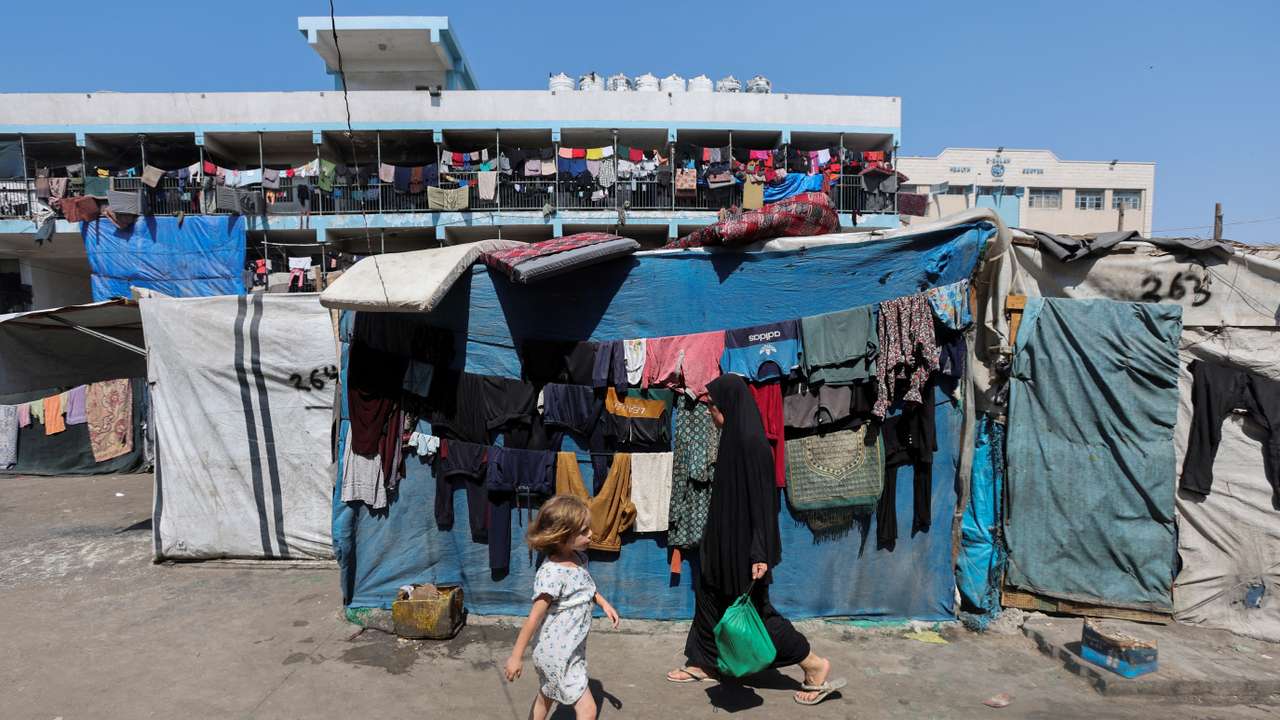 Displaced Palestinians shelter in a United Nations-run school, in Deir Al-Balah in the central Gaza Strip