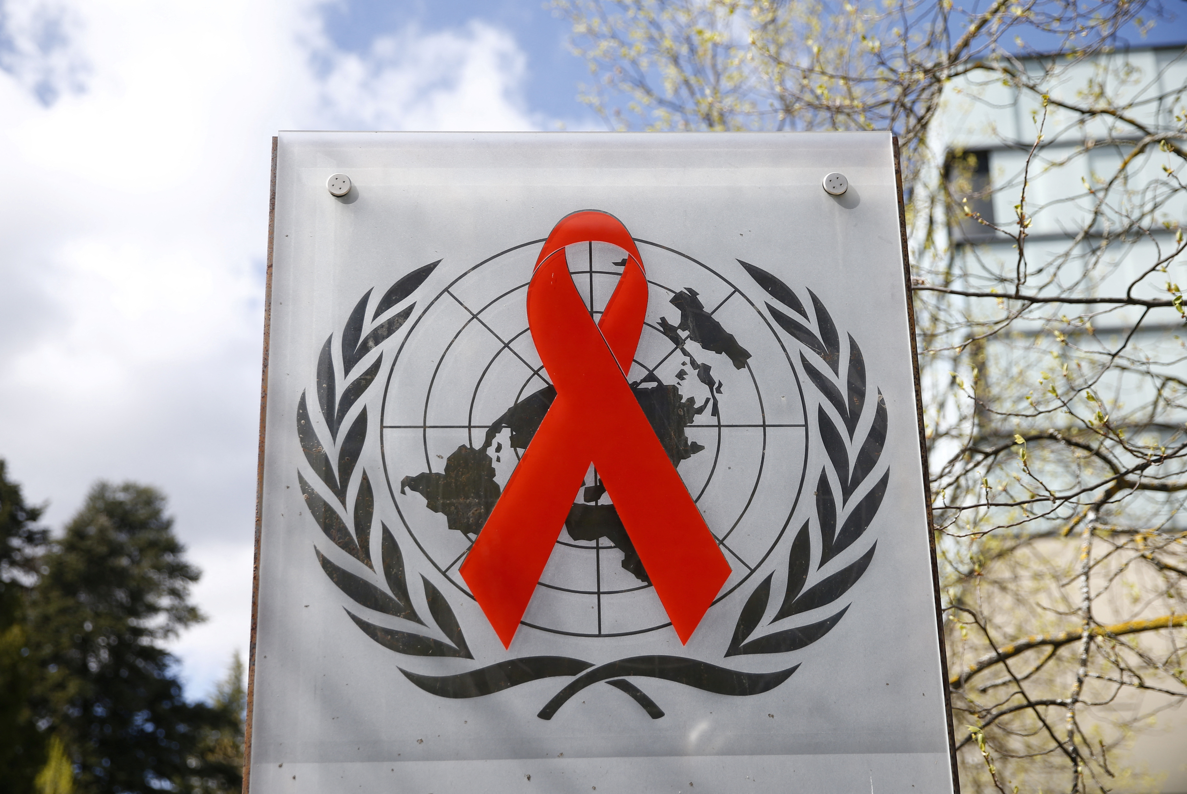 FILE PHOTO: Logo pictured outside United Nations AIDS agency (UNAIDS) building in Geneva