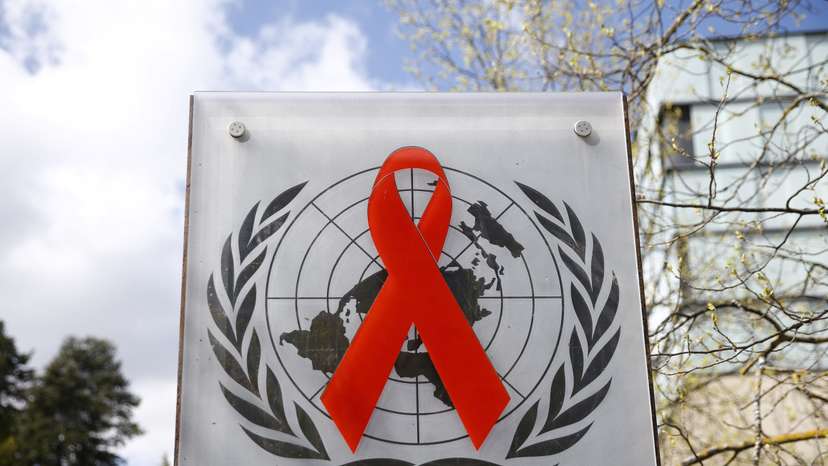 FILE PHOTO: Logo pictured outside United Nations AIDS agency (UNAIDS) building in Geneva