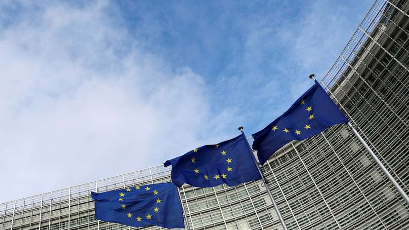 FILE PHOTO: EU flags fly outside the European Commission in Brussels