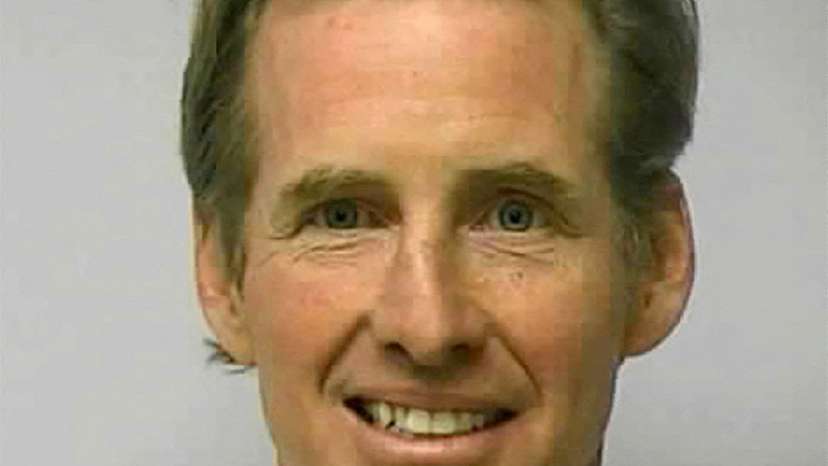 FILE PHOTO: Ryan W. Routh poses in a jail booking photograph in Greensboro