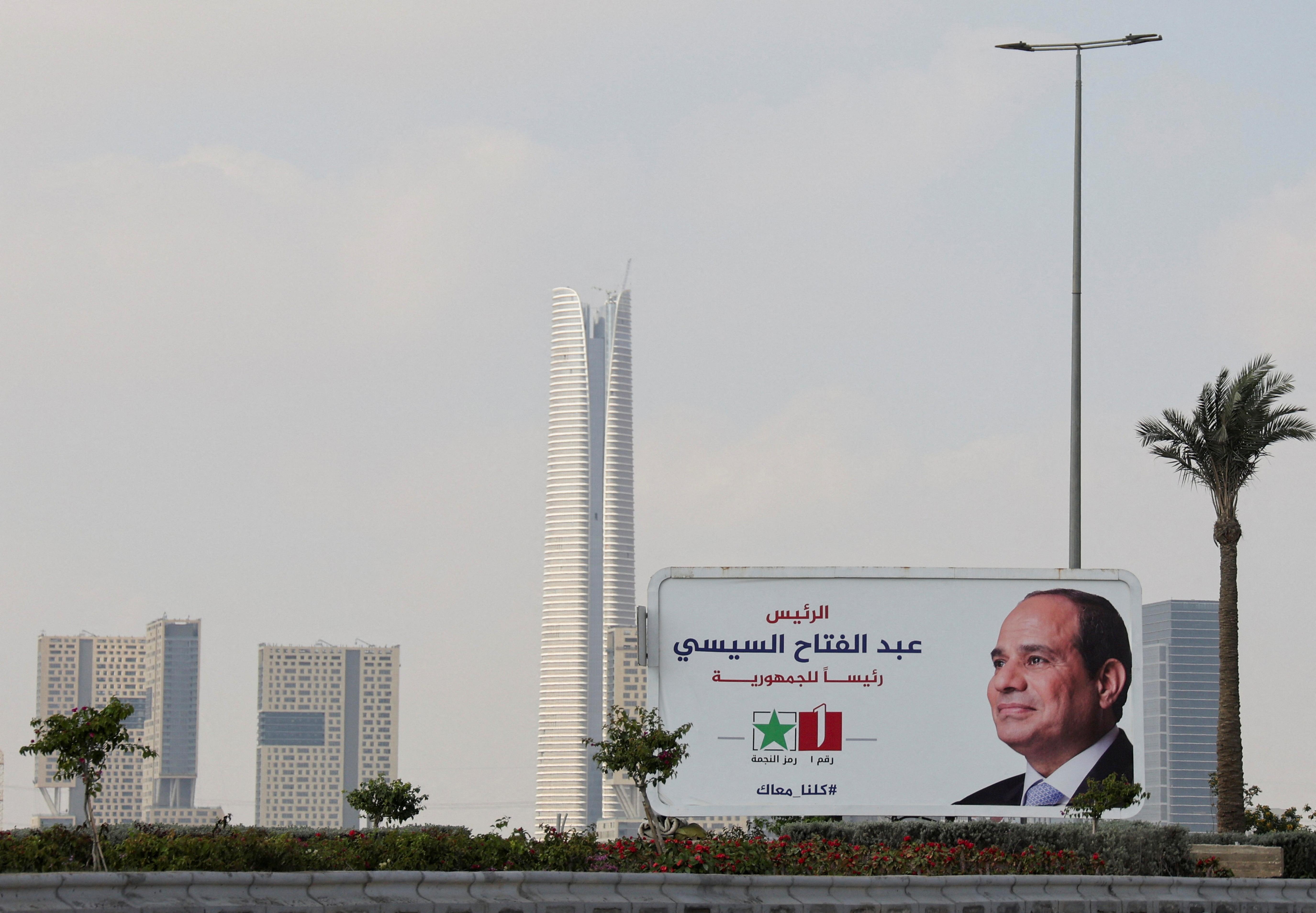 Banners supporting presidential candidate and current Egyptian President Abdel Fattah al-Sisi stand at the New Administrative Capital in the desert east of Cairo