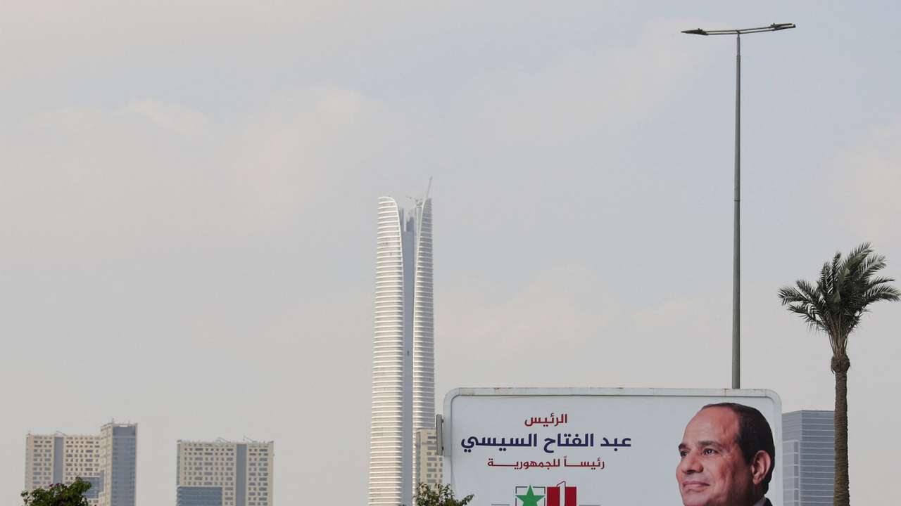 Banners supporting presidential candidate and current Egyptian President Abdel Fattah al-Sisi stand at the New Administrative Capital in the desert east of Cairo