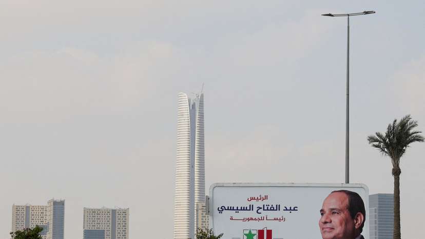 Banners supporting presidential candidate and current Egyptian President Abdel Fattah al-Sisi stand at the New Administrative Capital in the desert east of Cairo