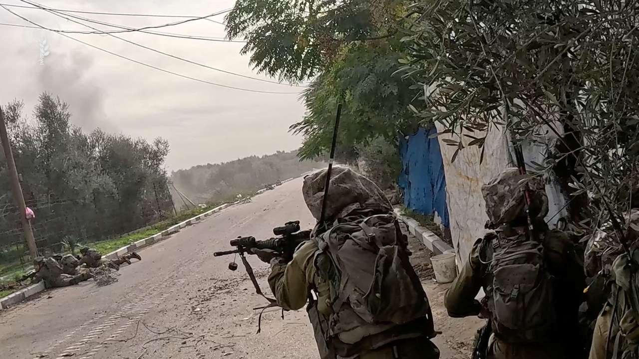 Israeli soldiers operate in a location given as Khan Younis