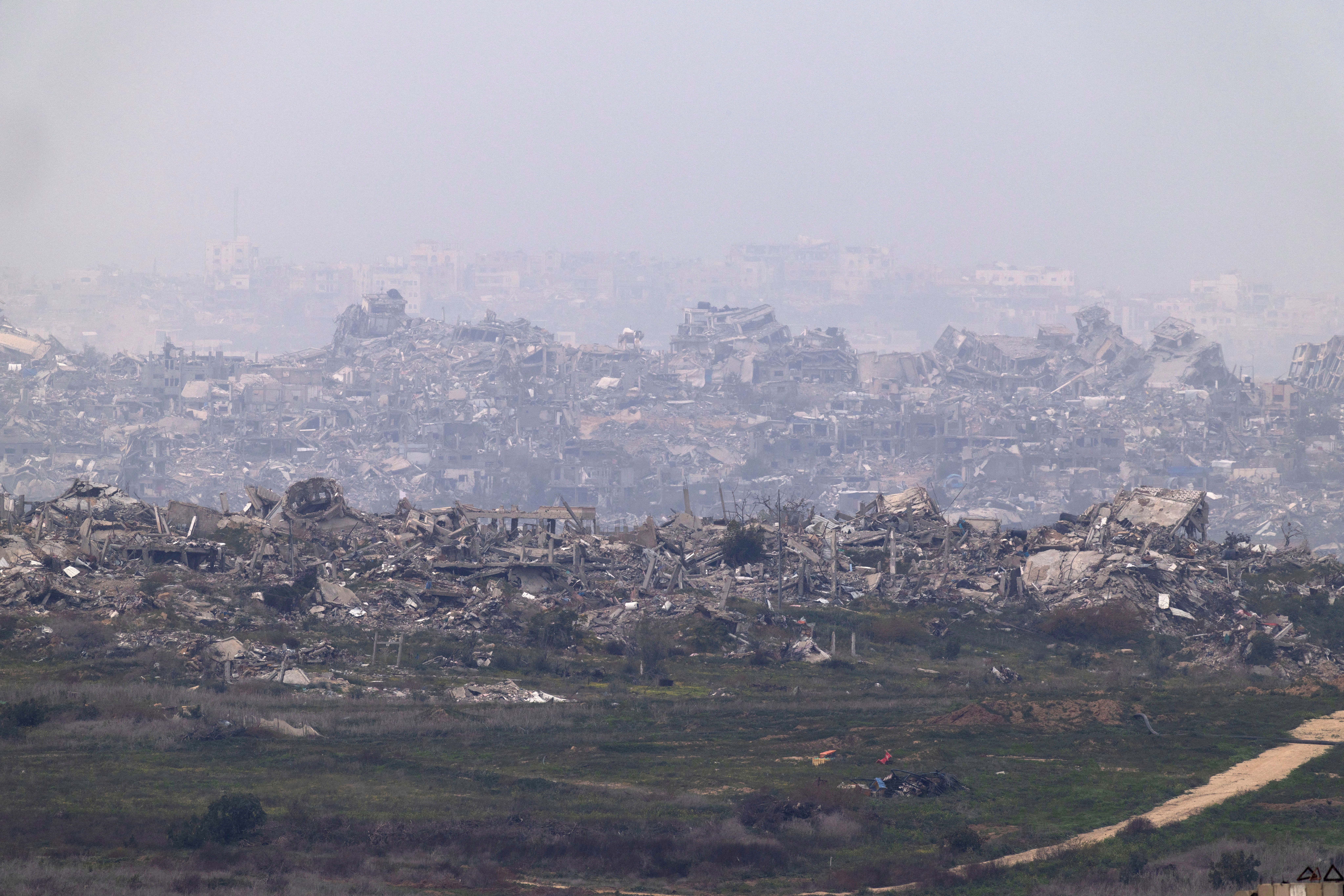 Buildings lie in ruin in Gaza amid a ceasefire between Israel and Hamas