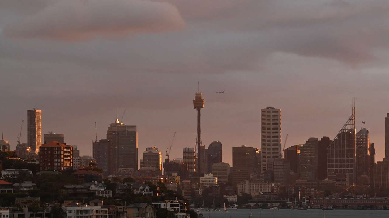 A view of the city skyline and Sydney Harbour, in Sydney
