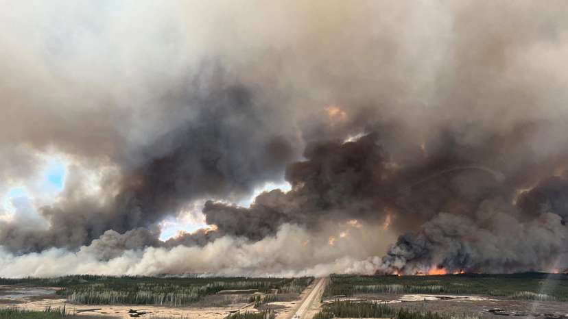 Smoke rises from mutual aid wildfire HTZ001 in the High Level Forest Area