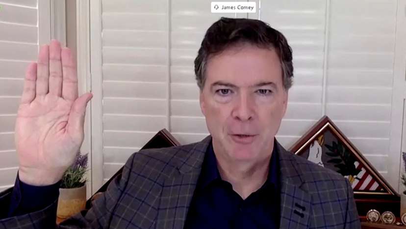 FILE PHOTO: Former FBI Director James Comey testifies before Senate Judiciary Committee in Washington