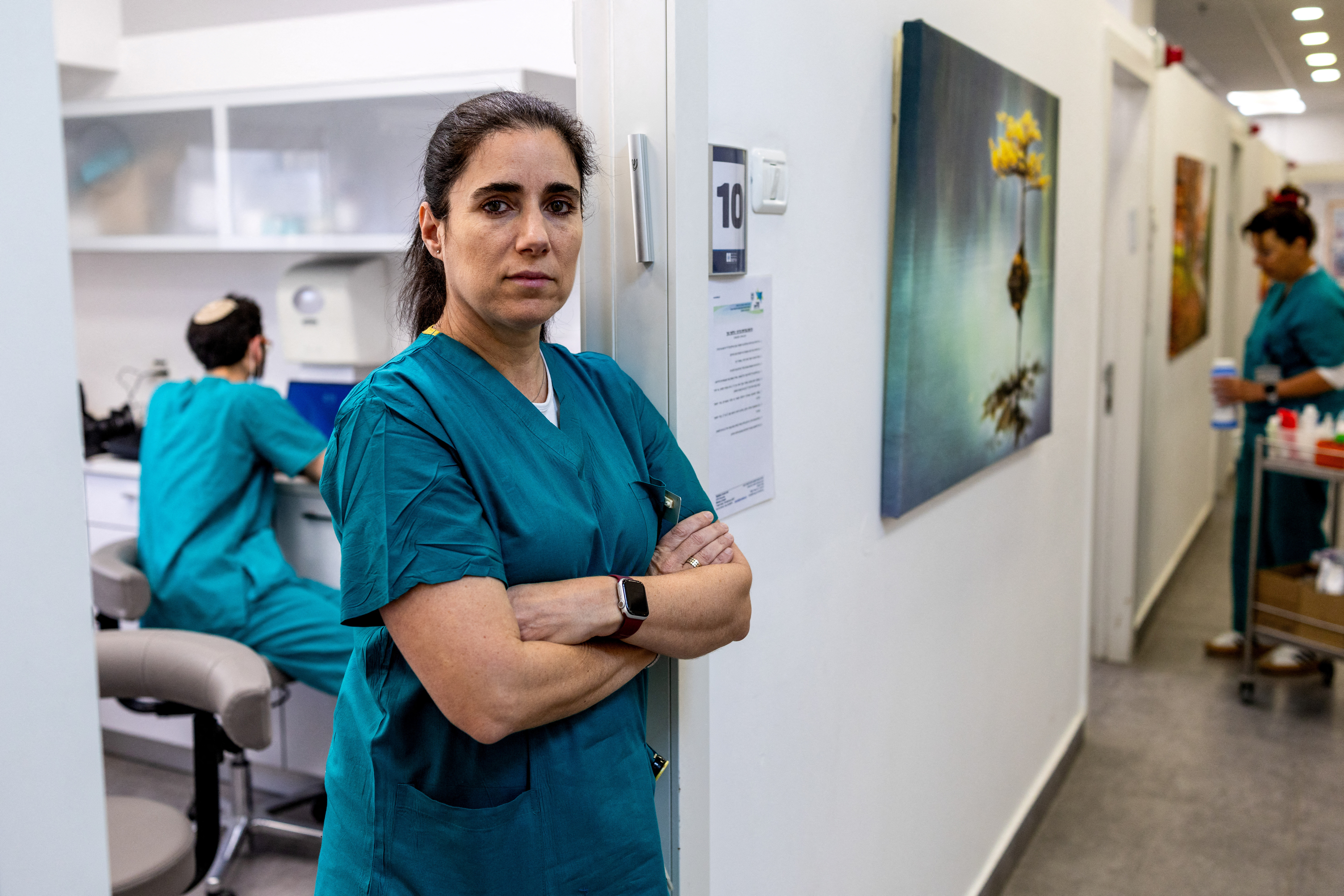 Forensic dentist Esi Sharon-Sagie, who has identified victims of Iranian missile strikes in Israel, victims of Hamas' October 7 attack, hostages and the body of Hamas leader Yahya Sinwar, in her clinic during an interview with Reuters, in Jerusalem