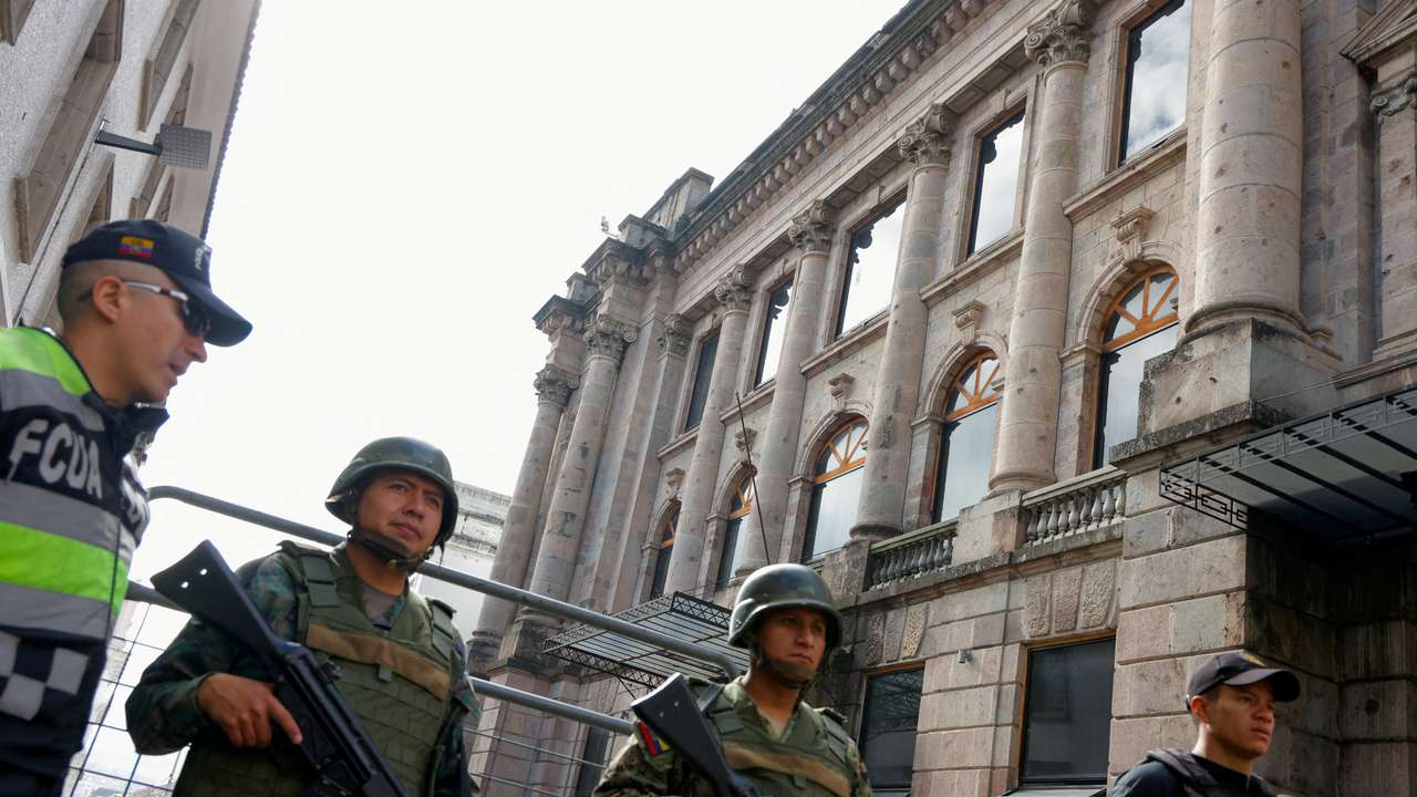 FILE PHOTO: Soldiers stand guard outside the presidential palace in Quito