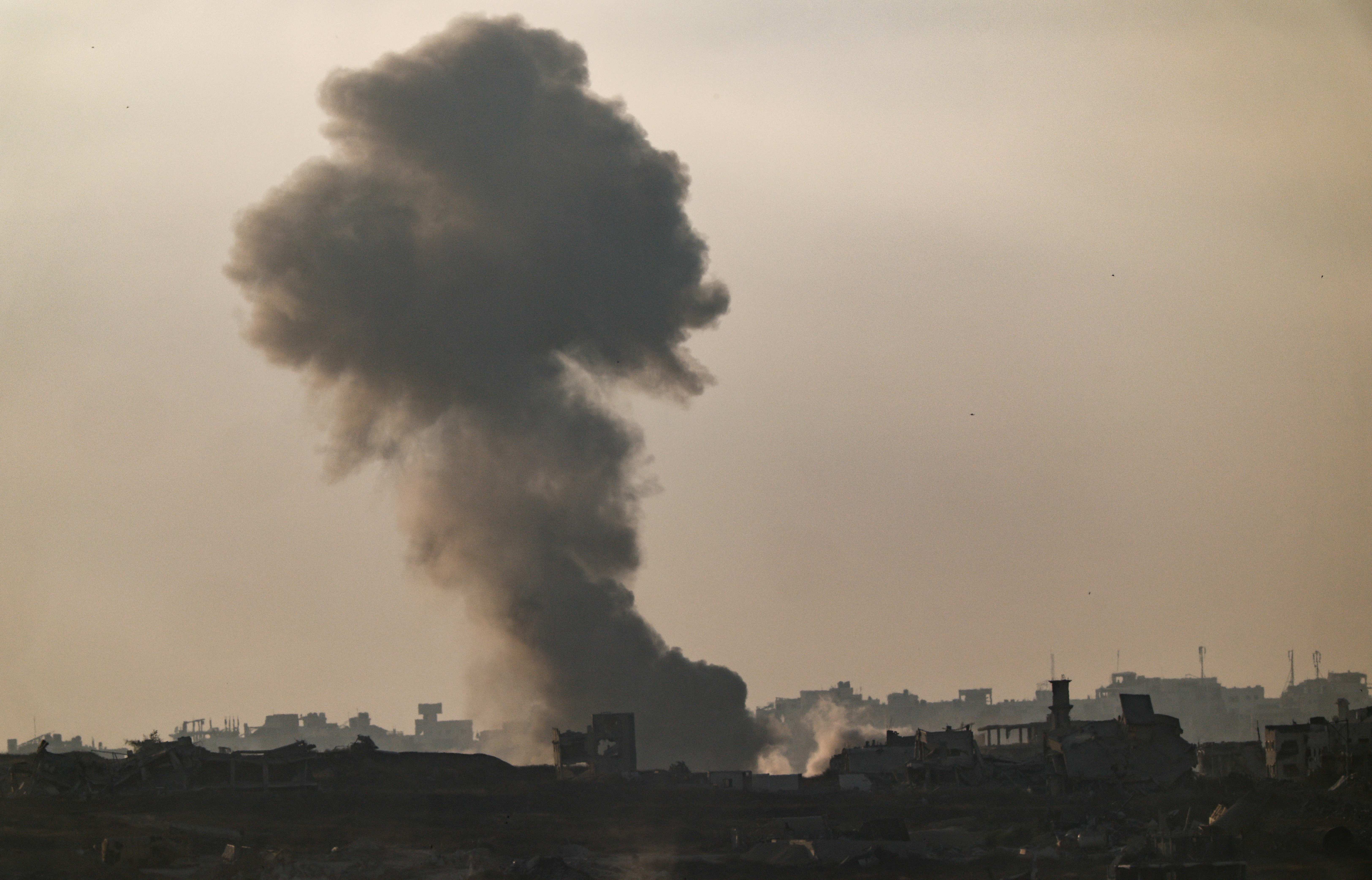 Smoke rises from Gaza after an explosion