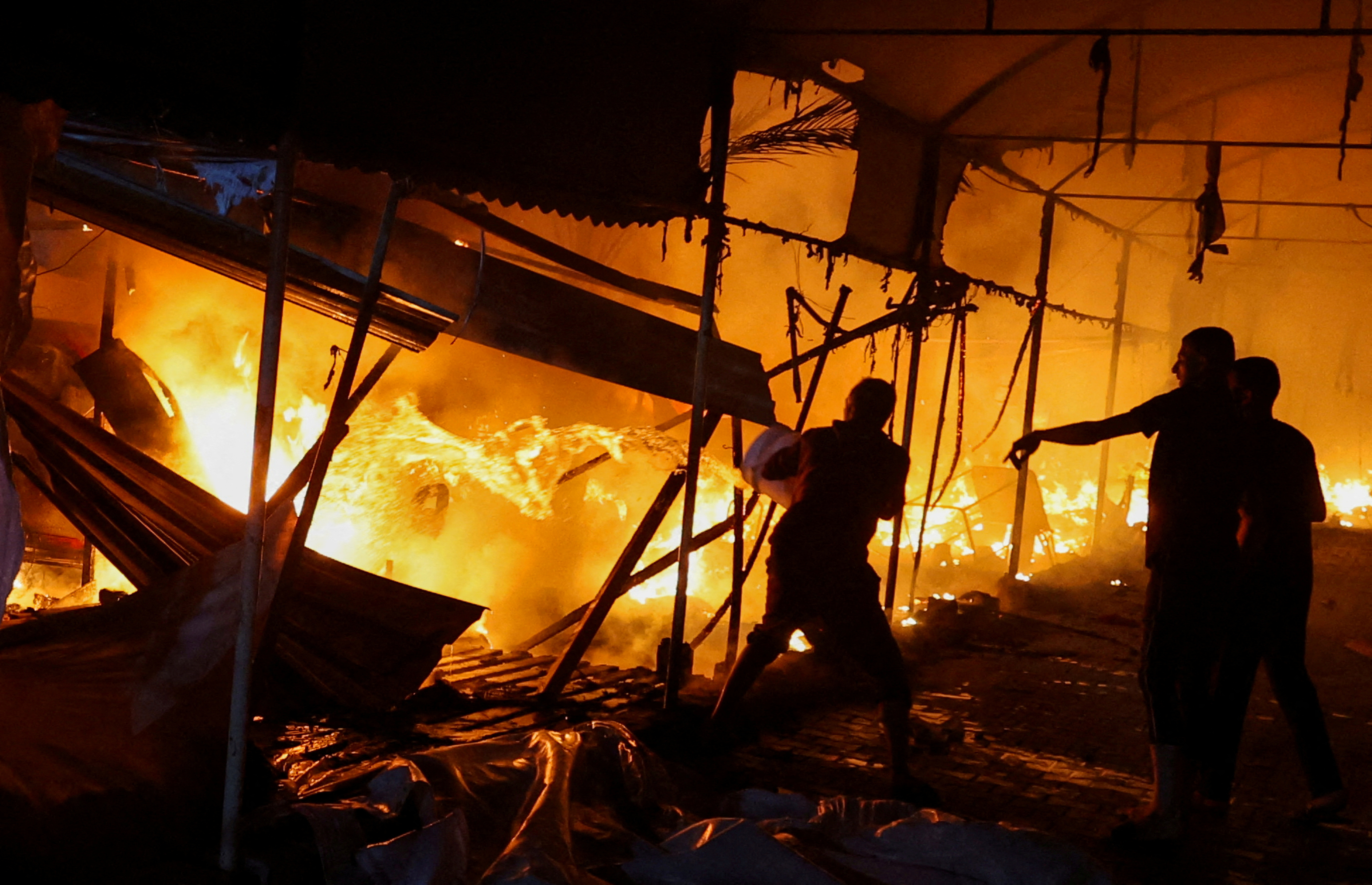 FILE PHOTO: Israeli strike on tents sheltering displaced people, amid the Israel-Hamas conflict, in Deir Al-Balah