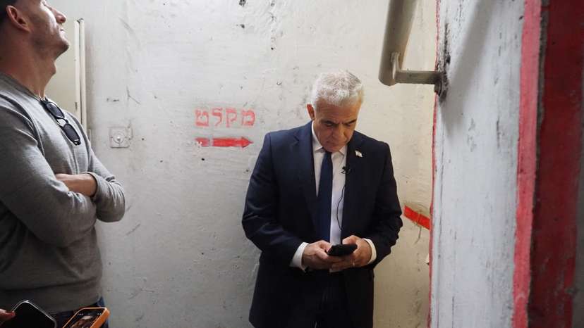 Israeli opposition leader Yair Lapid takes cover in a shelter in Tel Aviv