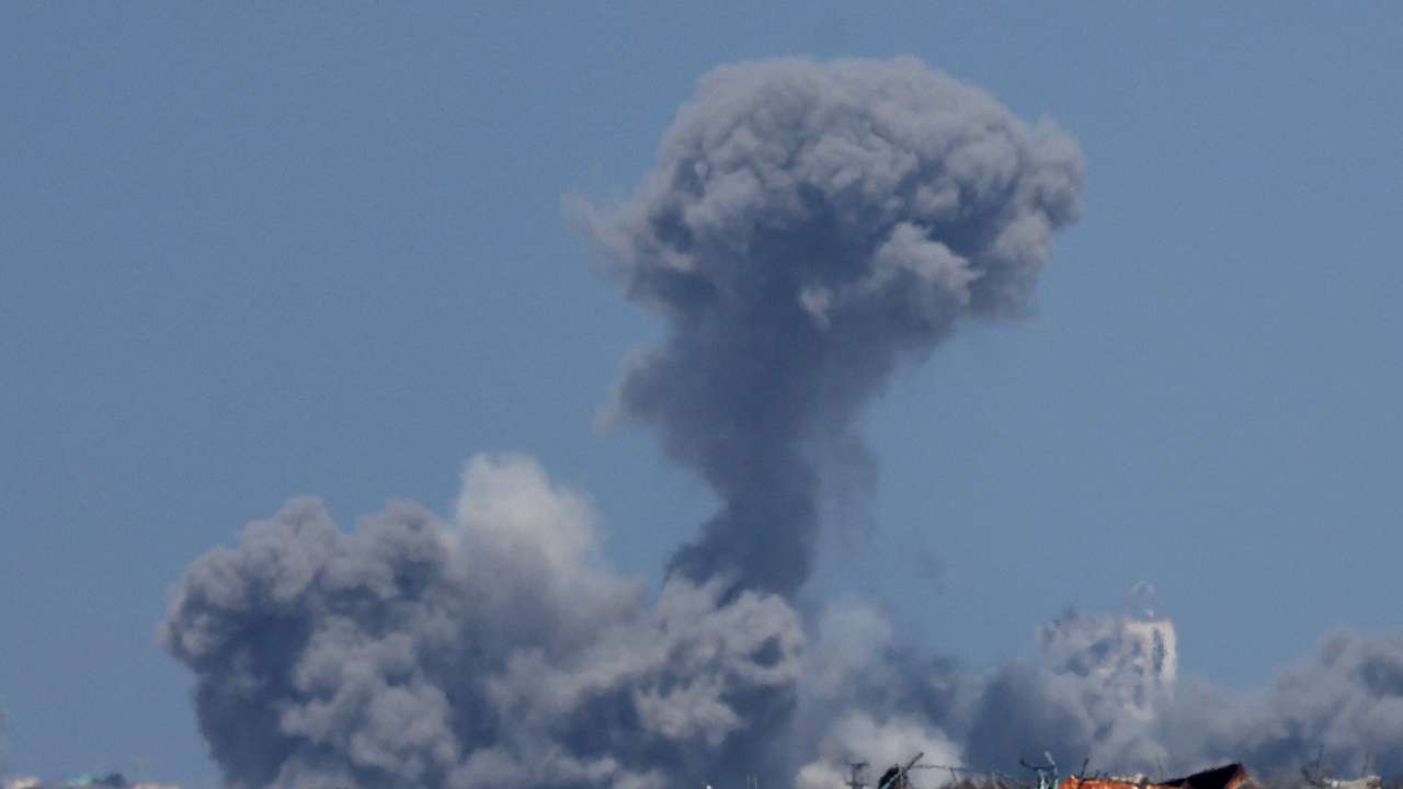 Smoke rises from an explosion in Gaza, amid the Israel-Hamas conflict, near the Israel-Gaza border as seen from Israel