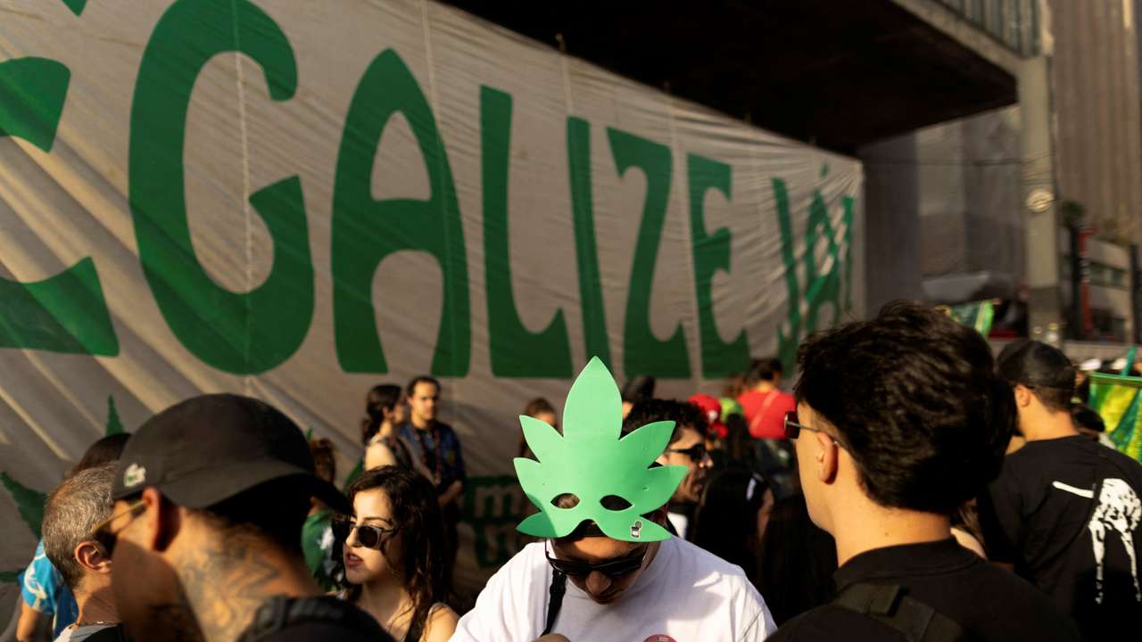 People take part in a march demanding the legalisation of cannabis in Sao Paulo, Brazil